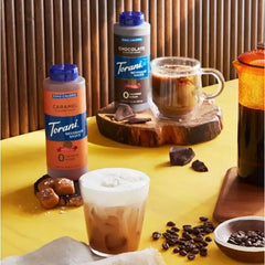 Keto Store NZ | Torani Sauces | Torani Caramel and Chocolate sauce bottles with coffee drinks and ingredients