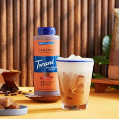 Keto Store NZ | Torani Caramel Sauce | Torani caramel flavoured sauce bottle with a glass of iced coffee