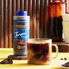 Keto Store NZ | Torani Chocolate Sauce | Torani chocolate sauce bottle next to a glass of iced coffee